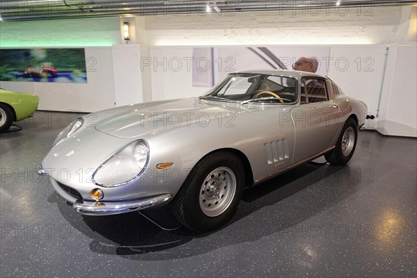 FERARI 275 GTB 4, A silver-coloured classic Ferrari in a showroom surrounded by other classic cars, AUTOMUSEUM PROTOTYP, Hamburg, Hanseatic City of Hamburg, Germany Europe