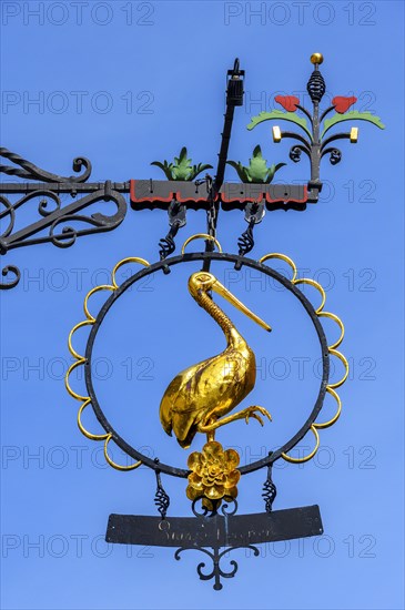 Wrought iron nose plate with stork bird, Kaufbeuern, Allgaeu, Swabia, Bavaria, Germany, Europe