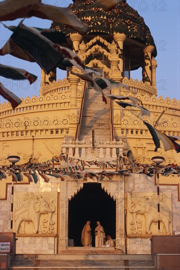 Jain nuns at the entrance of a jain temple, jain pilgrimage site, Palitana, Gujarat, India. They belong to the Swetambar branch of jainism