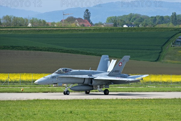 FA 18C Hornet multi-role fighter aircraft of the Swiss Air Force with air brake deployed during landing, Payerne military airfield, Payerne, Vaud, Switzerland, Europe