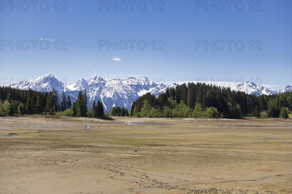 Drained Forggensee, empty, reservoir, flood protection, Allgaeu Alps, snow, Ostallgaeu, Bavaria, Germany, Europe