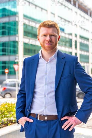 Vertical three quarter length portrait of a confident businessman in the city