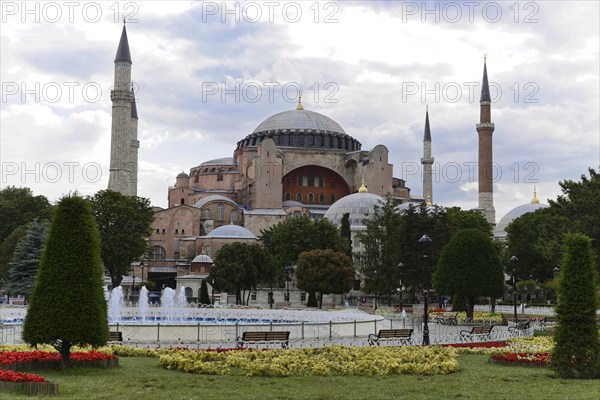 Front view of the Hagia Sophia with fountain and flower beds in Istanbul, Istanbul, Istanbul Province, Turkey, Asia