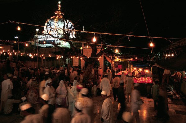 Dargah sharif illuminated at night, Moinuddin Chishti mausoleum at the time of the annual festival commemorating his death, Major muslim pilgrimage site in Ajmer, India, Asia