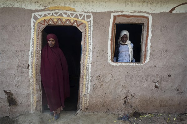 Muslim mother and daughter at home in the Oromia state, Ethiopia. The husband drowned in the Mediterranean sea while trying to migrate to Europe