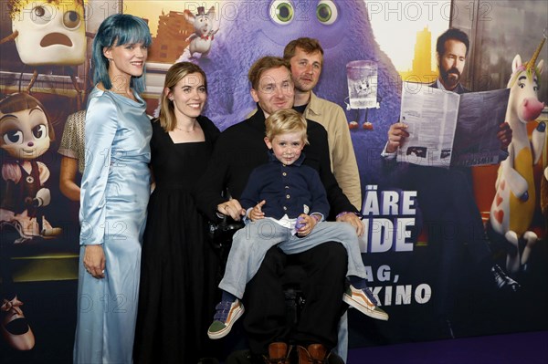 Samuel Koch with woman Sarah Elena Timpe, brother Jonathan Koch with woman Anna Fahrnlaender and son Theodor Koch at the special screening of IF: IMAGINARY FRIENDS at the CinemaxX cinema in Berlin on 12 May 2024