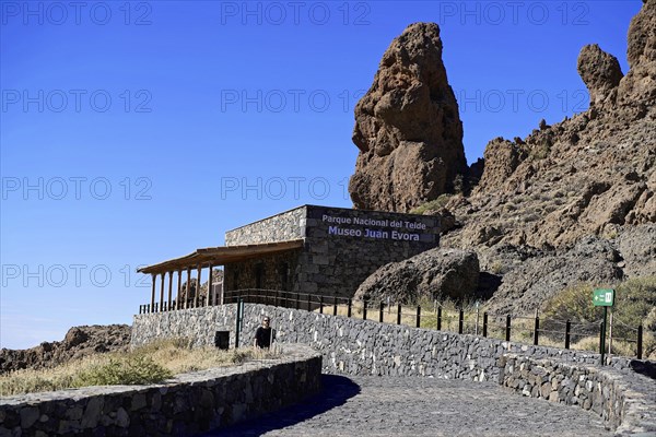 On the way to Mount Teide, El Teide, Pico del Teide, volcano in the Teide National Park on Tenerife, Canary Islands, Spain, Europe, Stone building of the Museo Juan Evora amidst imposing rock formations and under a clear blue sky, Tenerife, Europe