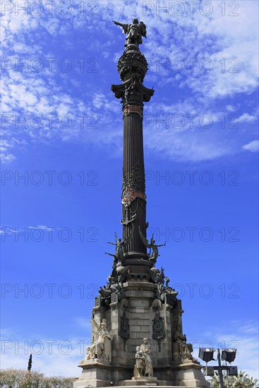 Monument a Colom, Colombus Column, Barcelona, Catalonia, Spain, Europe, High column with statue and other sculptures in front of a blue sky, Europe