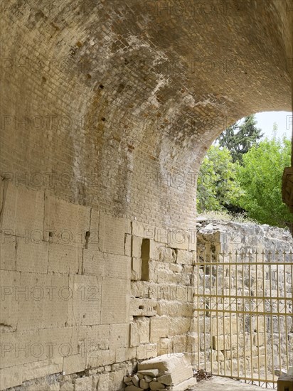 Wall of archway behind amphitheatre carved written chiselled laws City law of Gortys carved in stone Gortyn law book Large inscription, written in Doric dialect alternately from left to right and right to left, oldest discovered legal text in Europe, Gortyna, Crete, Greece, Europe