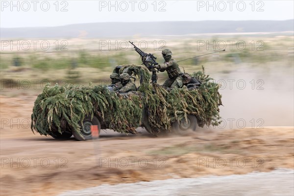 Dutch soldiers on a camouflaged Mercedes G280 CDI during the NATO Steadfast Defender large-scale manoeuvre in Pabrade, 29.05.2024