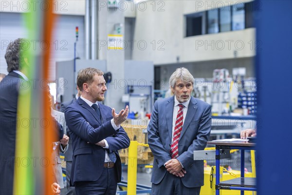 Minister President Michael Kretschmer visited TRUMPF Sachsen SE in Neukirch. After being welcomed by Dr Nicola Leibinger-Kammueller, CEO of TRUMPF SE + Co KG, and Dr Mathias Kammueller, CDO of TRUMPF SE + Co KG, the Minister-President talked to those present and took part in a tour of the company. The company is one of the international market and technology leaders in the field of machine tools and lasers for industrial production, Neukirch/Lausitz, Saxony, Germany, Europe