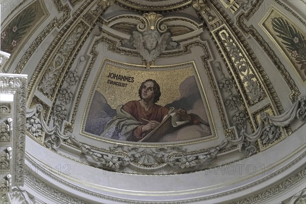 Interior view of Berlin Cathedral, Berlin, Germany, Europe, mosaic of St John the Evangelist, embedded in a richly decorated historical ceiling, Europe