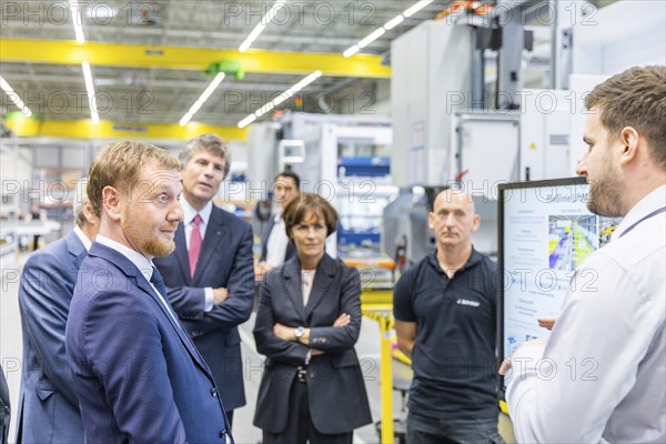 Minister President Michael Kretschmer visited TRUMPF Sachsen SE in Neukirch. After being welcomed by Dr Nicola Leibinger-Kammueller, CEO of TRUMPF SE + Co KG, and Dr Mathias Kammueller, CDO of TRUMPF SE + Co KG, the Minister-President talked to those present and took part in a tour of the company. The company is one of the international market and technology leaders in the field of machine tools and lasers for industrial production, Neukirch/Lausitz, Saxony, Germany, Europe