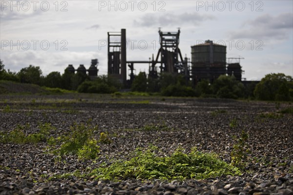 The dreary Hympendahl slag heap with the listed Phoenix-West blast furnace works, Hoerde, Dortmund, Ruhr area, North Rhine-Westphalia, Germany, Europe