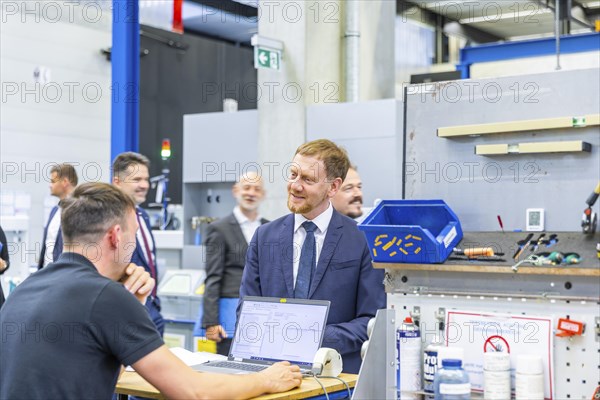 Minister President Michael Kretschmer visited TRUMPF Sachsen SE in Neukirch. After being welcomed by Dr Nicola Leibinger-Kammueller, CEO of TRUMPF SE + Co KG, and Dr Mathias Kammueller, CDO of TRUMPF SE + Co KG, the Minister-President talked to those present and took part in a tour of the company. The company is one of the international market and technology leaders in the field of machine tools and lasers for industrial production, Neukirch/Lausitz, Saxony, Germany, Europe