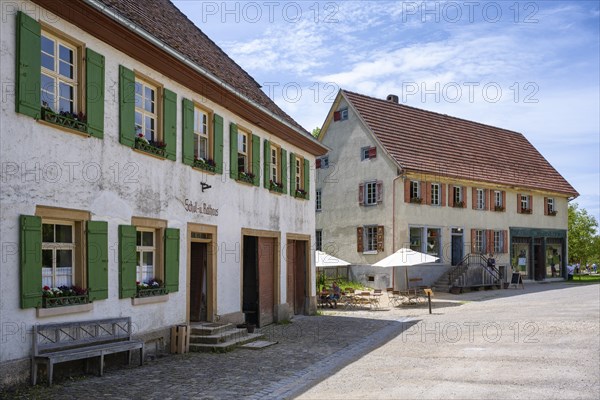 Traditionally built old schoolhouse, also the town hall, built in 1830, original location: Bubsheim, district of Tuttlingen, to the right is the Pfeiffer department stores', built in 1852, original location: Stetten am kalten Markt, district of Sigmaringen, open-air museum Neuhausen ob Eck, district of Tuttlingen, Baden-Wuerttemberg, Germany, Europe