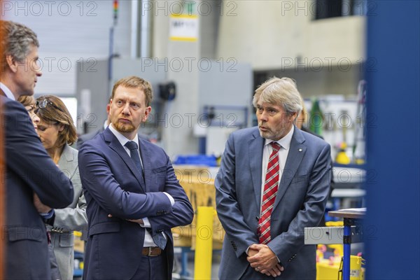 Minister President Michael Kretschmer visited TRUMPF Sachsen SE in Neukirch. After being welcomed by Dr Nicola Leibinger-Kammueller, CEO of TRUMPF SE + Co KG, and Dr Mathias Kammueller, CDO of TRUMPF SE + Co KG, the Minister-President talked to those present and took part in a tour of the company. The company is one of the international market and technology leaders in the field of machine tools and lasers for industrial production, Neukirch/Lausitz, Saxony, Germany, Europe