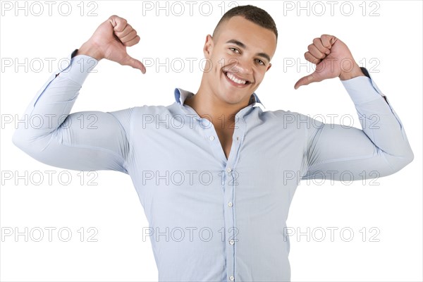 Happy man pointing at himself, isolated in white