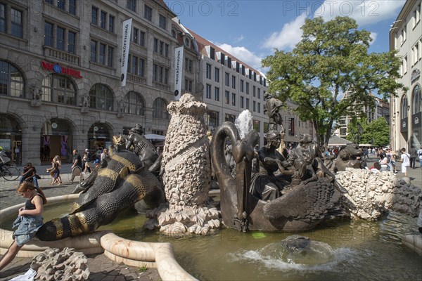 Fountain the marriage carousel, designed after a poem by Hans Sachs, created by the sculptor Jürgen Weber and built in 1984, left Kaufhaus Weisser Turm, Nuremberg, Middle Franconia, Bavaria, Germany, Europe