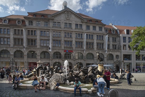 Fountain the marriage carousel, designed after a poem by Hans Sachs, designed by the sculptor Jürgen Weber and built in 1984, behind the Weisser Turm department stores', Nuremberg, Middle Franconia, Bavaria, Germany, Europe