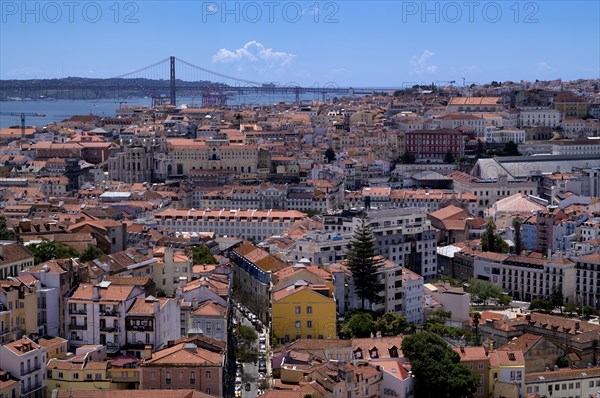 View from the viewpoint Miradouro da Graça, also Sophia de Mello Breyner Andresen, city view, historic city centre, bridge 25 de Abril, river Tejo, Lisbon, Portugal, Europe