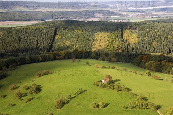 Landscape in Saaleholzland with a view from the keep of Leuchtenburg Castle, Jena can be seen on the horizon in the background