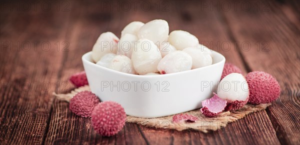 Portion of fresh Lychees (close-up shot, selective focus)