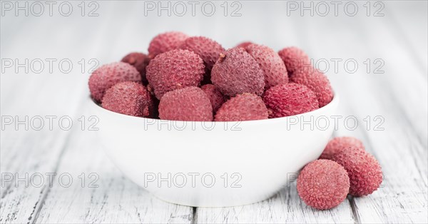 Portion of fresh Lychees (close-up shot, selective focus)