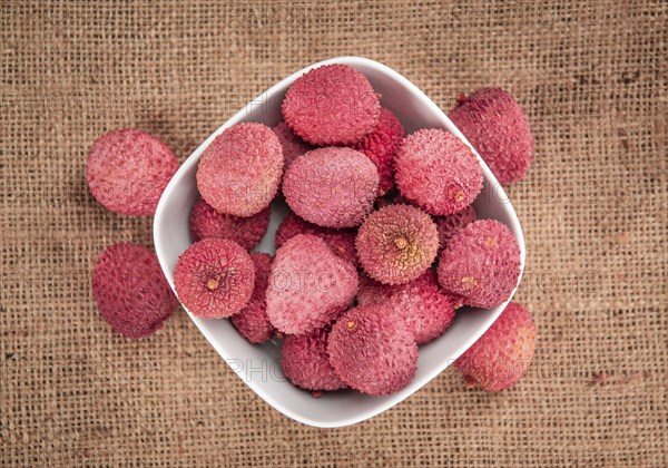 Portion of fresh Lychees (close-up shot, selective focus)