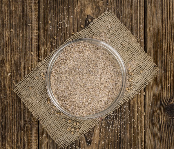 Portion of Wheat Bran as detailed close-up shot, selective focus