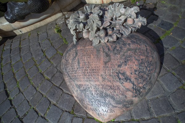 Hans Sachs poem The Marriage Carousel engraved in a Mormor heart, at the fountain The Marriage Carousel, Nuremberg, Middle Franconia, Bavaria, Germany, Europe