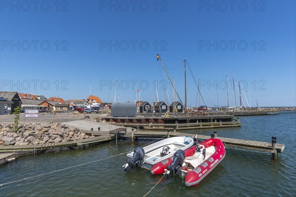 Lundeborg, small harbour town on East Fyn, jetty, sailing harbour with wooden houses, rubber dinghies with motor, Hesselager, Fyn, Denmark, Europe