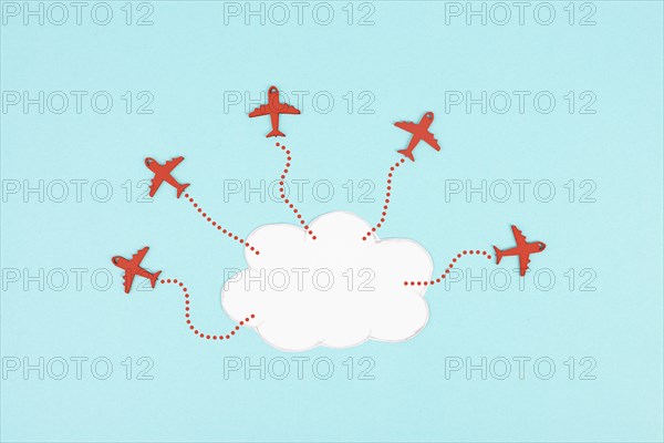 Red airplanes flying out of a cloud, brainstorming for ideas in a team, startup in business, having a goal, positive mindset