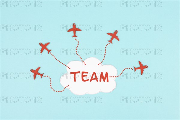 Red airplanes flying out of a cloud, brainstorming for ideas in a team, startup in business, having a goal, positive mindset