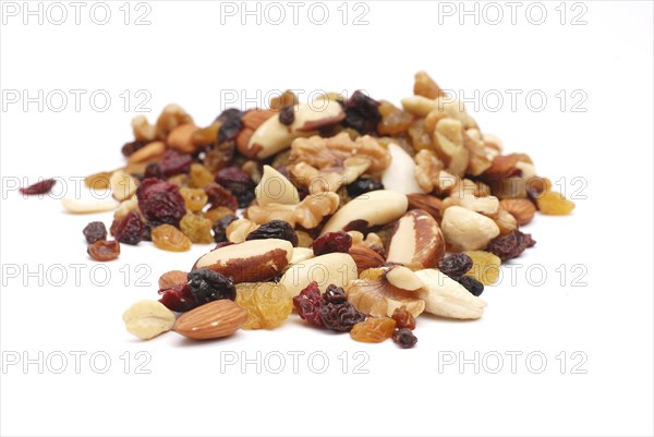 Mixture of nuts, dry fruits, healthy food, white background