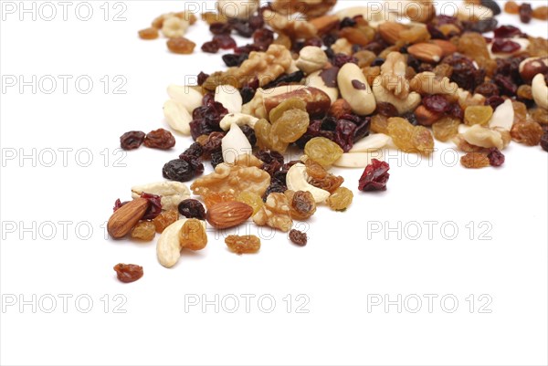 Mixture of nuts, dry fruits, healthy food, white background