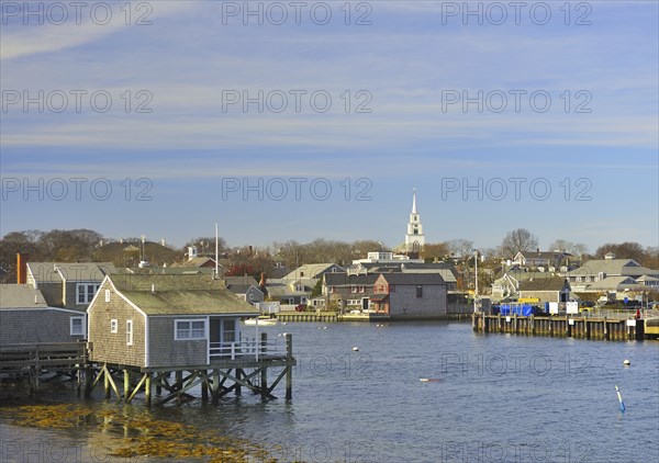 View of the island of Nantucket from the ferry arriving at Nantucket Harbor, Nantucket, Massachusetts, (part of Cape Cod and the Islands) USA