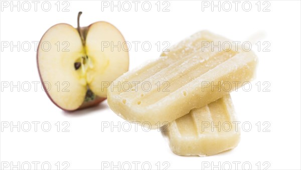 Fresh made Apple Popsicles (close-up shot) isolated on white background