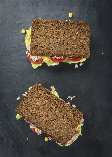 Fresh made Tuna sandwich with wholemeal bread (selective focus, close-up shot)