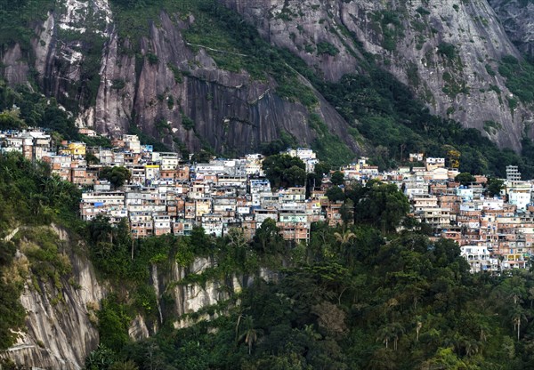 Favela Vidigal in Rio de Janeiro during sunset, aerial shot from a helicotper