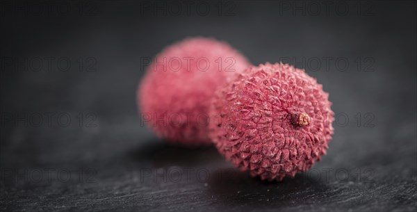 Portion of fresh Lychees (close-up shot, selective focus)