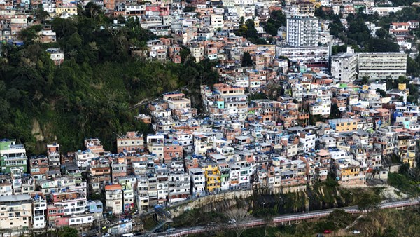 Favela Vidigal in Rio de Janeiro during sunset, aerial shot from a helicotper