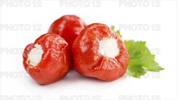 Fresh made Red Pepper (stuffed with cheese) isolated on white background (close-up shot)