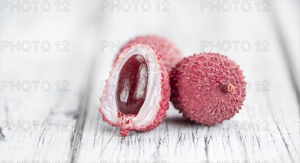 Portion of fresh Lychees (close-up shot, selective focus)