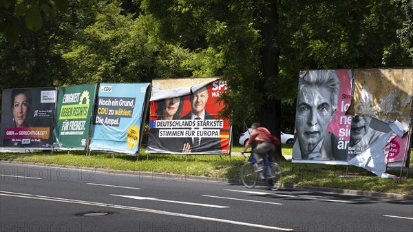 Election posters of the parties Alliance Sahra Wagenknecht, Greens, CDU, SPD and FDP stand on the edge of a street in Frankfurt am Main on the occasion of the 2024 European elections. The elections to the European Parliament will take place in the member states of the European Union (EU) from 6 to 9 June. In Germany, voting will take place on Sunday, 9 June, Bockenheim, Frankfurt am Main, Hesse, Germany, Europe