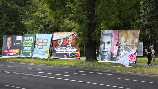 Election posters of the parties Alliance Sahra Wagenknecht, Greens, CDU, SPD and FDP stand on the edge of a street in Frankfurt am Main on the occasion of the 2024 European elections. The elections to the European Parliament will take place in the member states of the European Union (EU) from 6 to 9 June. In Germany, voting will take place on Sunday, 9 June, Bockenheim, Frankfurt am Main, Hesse, Germany, Europe