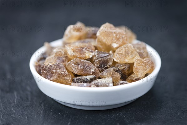 Slate slab with brown Rock Candy (close-up shot, selective focus)