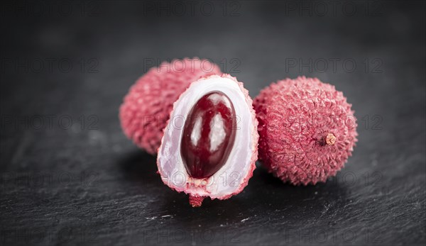 Portion of fresh Lychees (close-up shot, selective focus)