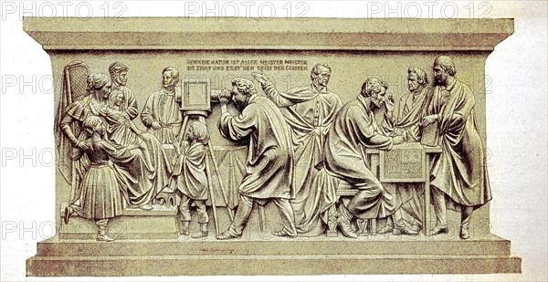 The pedestal relief by Friedrich Drake on the monument to Beuths zu Kiss in Berlin shows a photographer at work, Germany, digital reproduction of an original from the 19th century, original date unknown, Europe