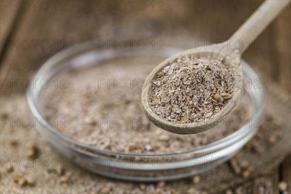 Portion of Wheat Bran as detailed close-up shot, selective focus